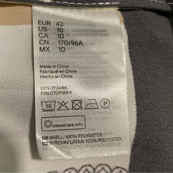 NWT H & M
Size 10
Black/Cream/Yellow & Pink
Bottom part is has pleats - Picture 2 of 7